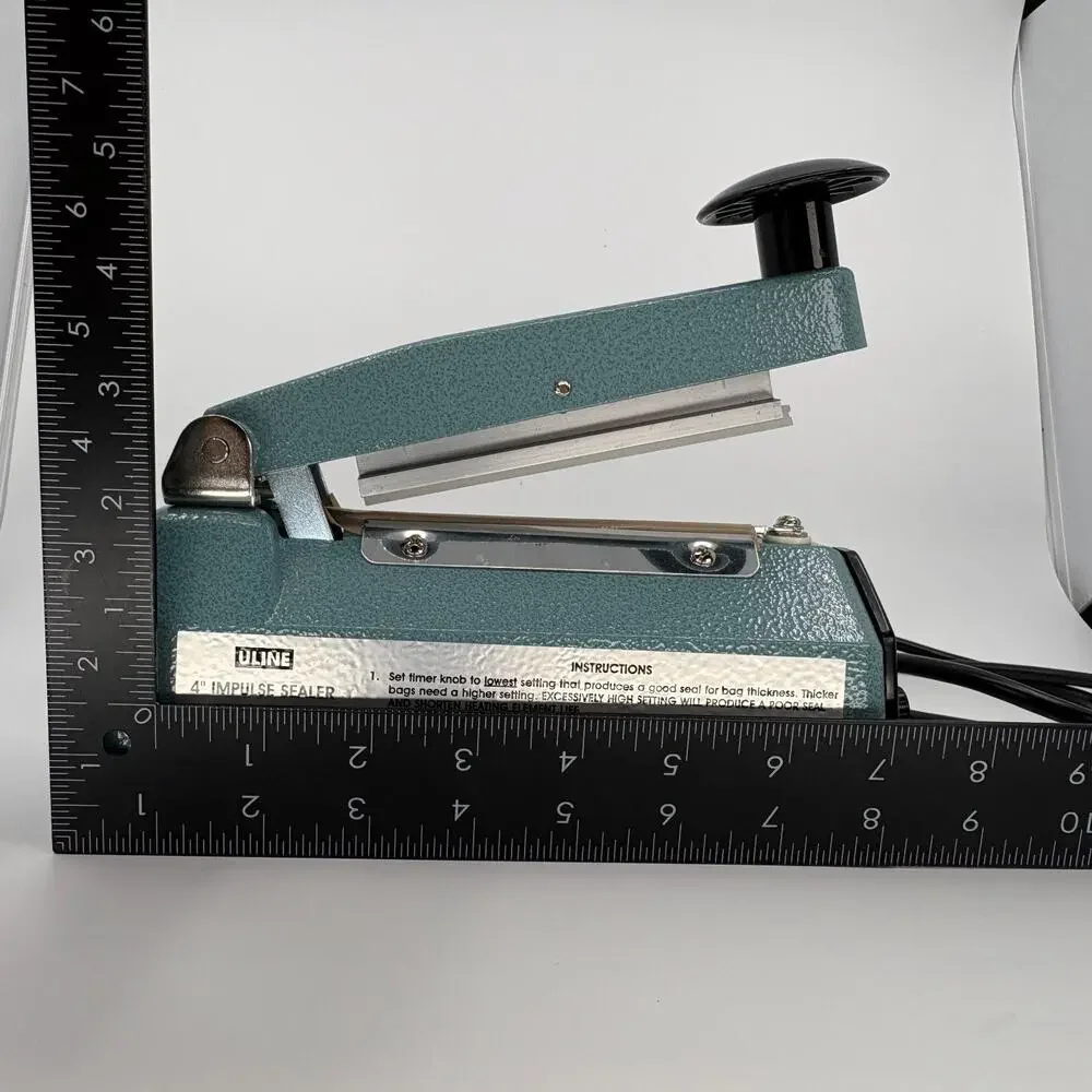 Uline H-458 4 Inch Impulse Sealer 120V 160W Plastic Bag Heat Sealer Powers on